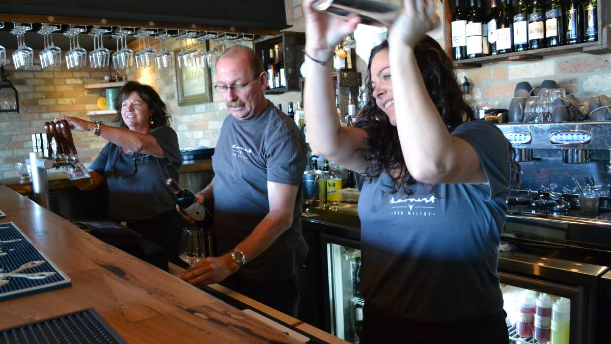 RAISING THE BAR: Melanie, Michael and Erin Clare at work in the recently opened Havest Bar in Milton, which combines the old and new.