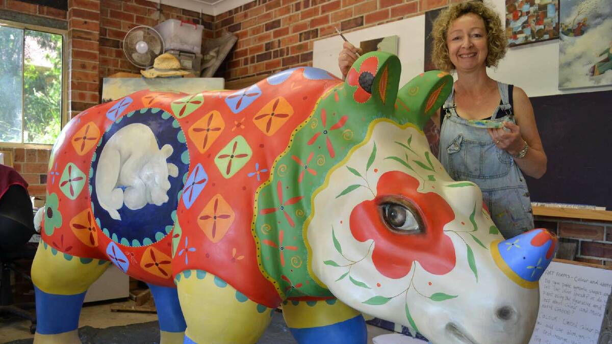 UNDER THE HAMMER: Artist Penny Lovelock’s is hoping her Javan fabric-inspired rhino sculpture will make its way home and become a feature in the Ulladulla Civic Centre when it is auctioned in Sydney next month.