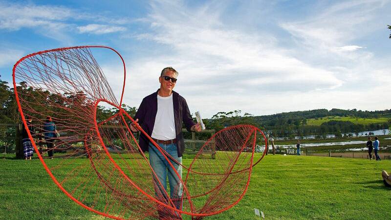 ARTISTIC: Bendalong based sculptor Simon Barton with his winning entry in 2013’s RIPE: Sculpture at Cupitt's Winery, this year sponsored by University of Wollongong.