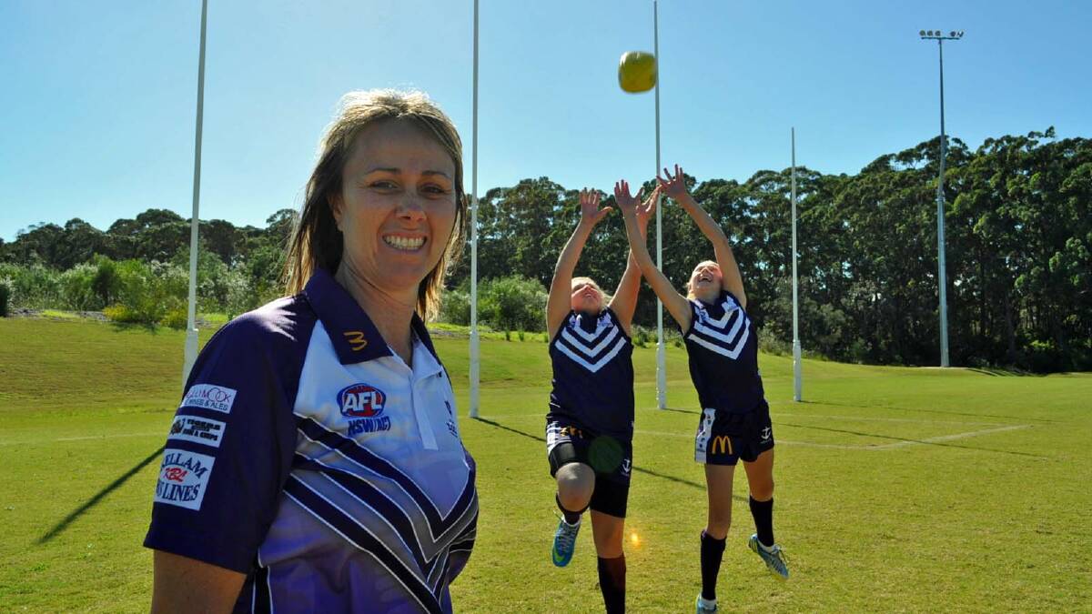 GAME ON: Ulladulla Dockers coach Kelli O’Brien plans to take her under 14s girls to victory this season, pictured with players Brittany Peters and Meg Buchanan. 