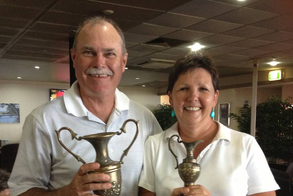 NAROOMA: On Sunday 16 residents of Marine Drive, Narooma got together to hold a 

fun golf day and these are the winners; Peter Boyle and Heather McMillan.
