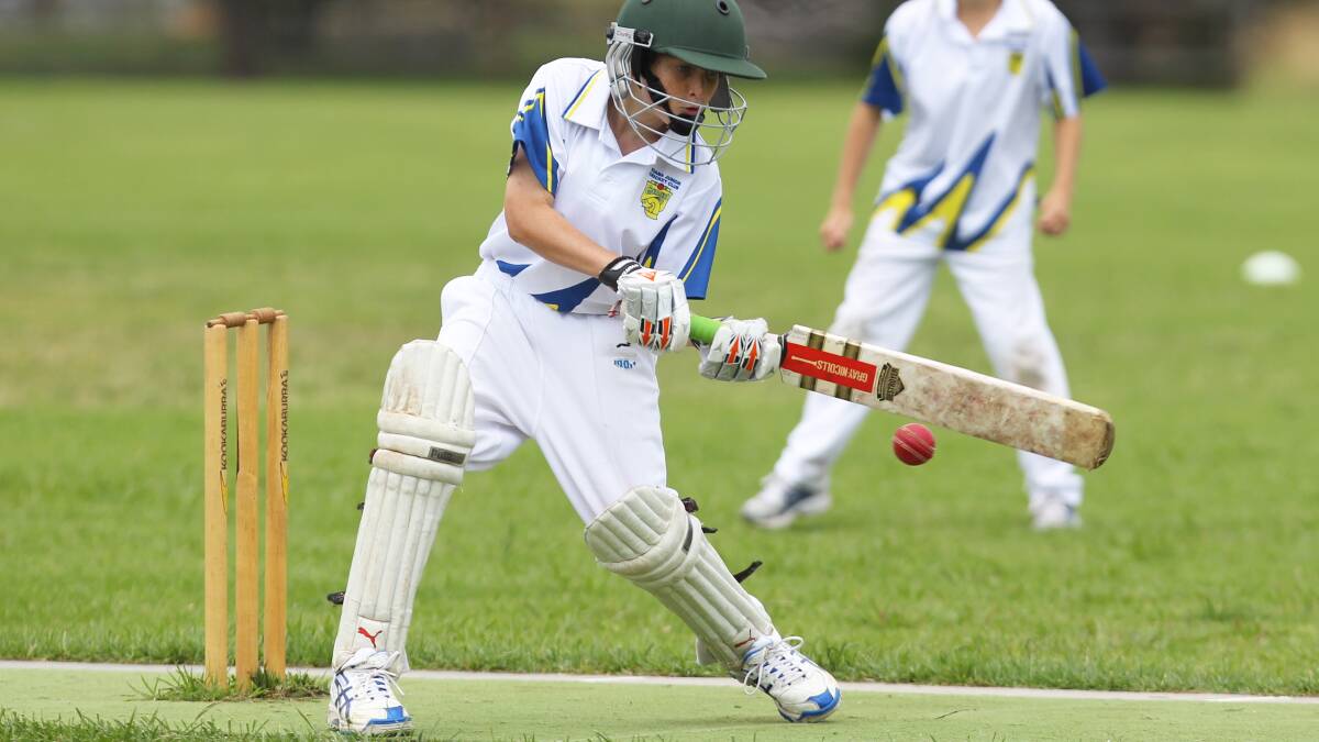KIAMA: Kiama Under-12 Gold opening batsman Solomon Ivanoff on his way to steering his side to a win with an unbeaten 22 not out. Picture: DAVID HALL