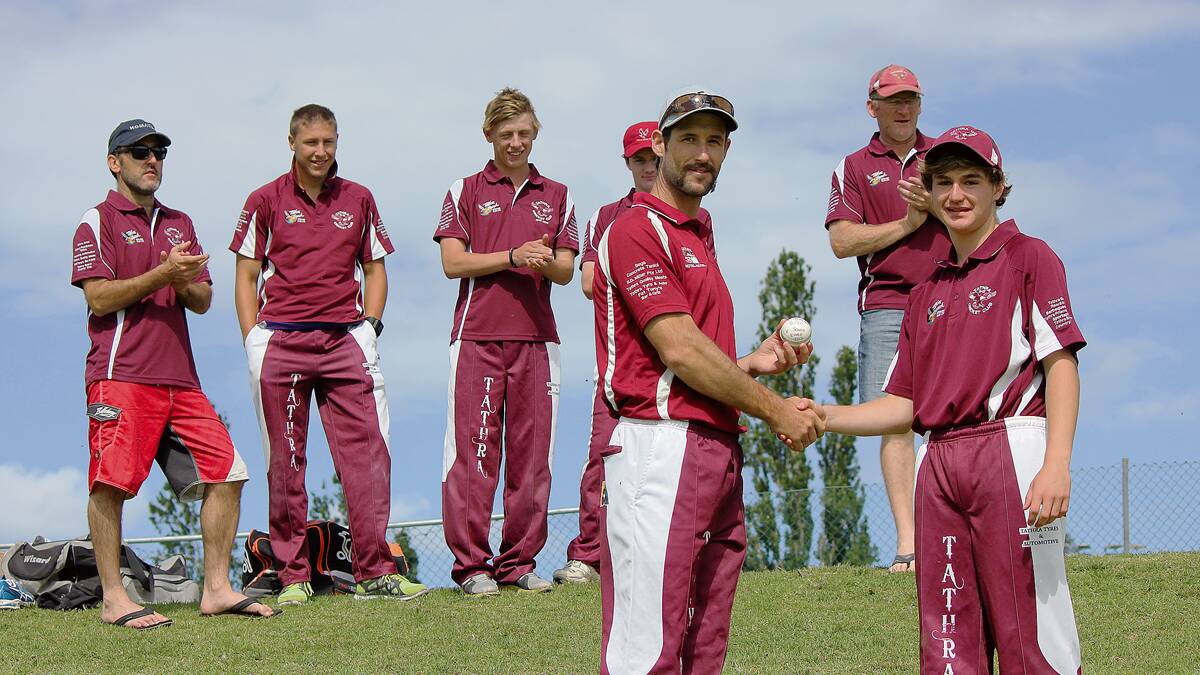 TATHRA: Lachlan Gordon (right) is presented the game ball by captain Ben O'Reilly after taking six wickets against South Eurobodalla on Saturday.  