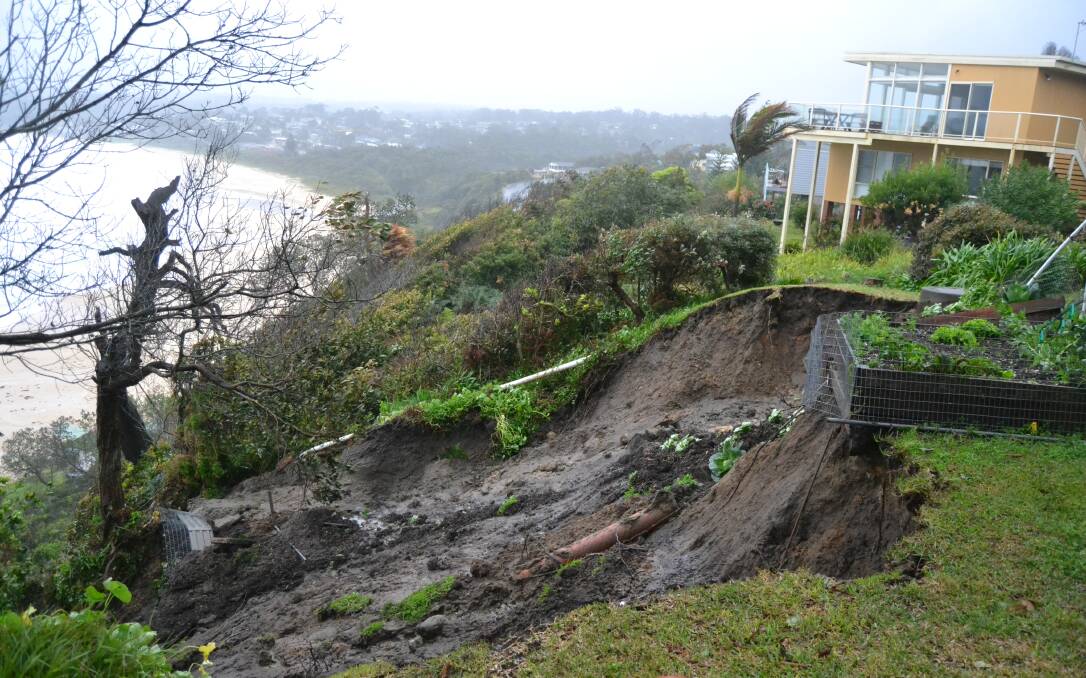 LANDSLIDE: The landslide in the backyard of a Mollymook home.