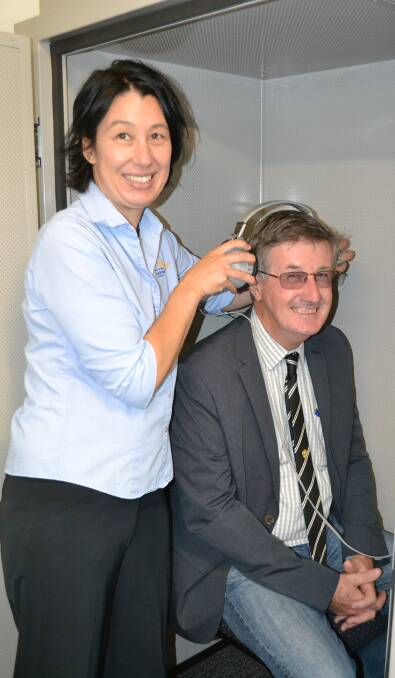 LISTEN UP: Alison Chiam puts Shoalhaven City Councillor Allan Baptist’s hearing to the test in the soundproof hearing booth.
