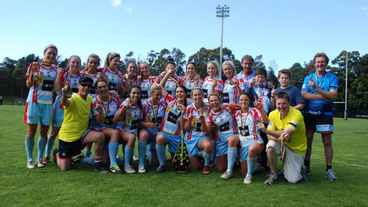 The MIlton-Ulladulla Bulldogs celebrating their Women's League Tag premiership win. 