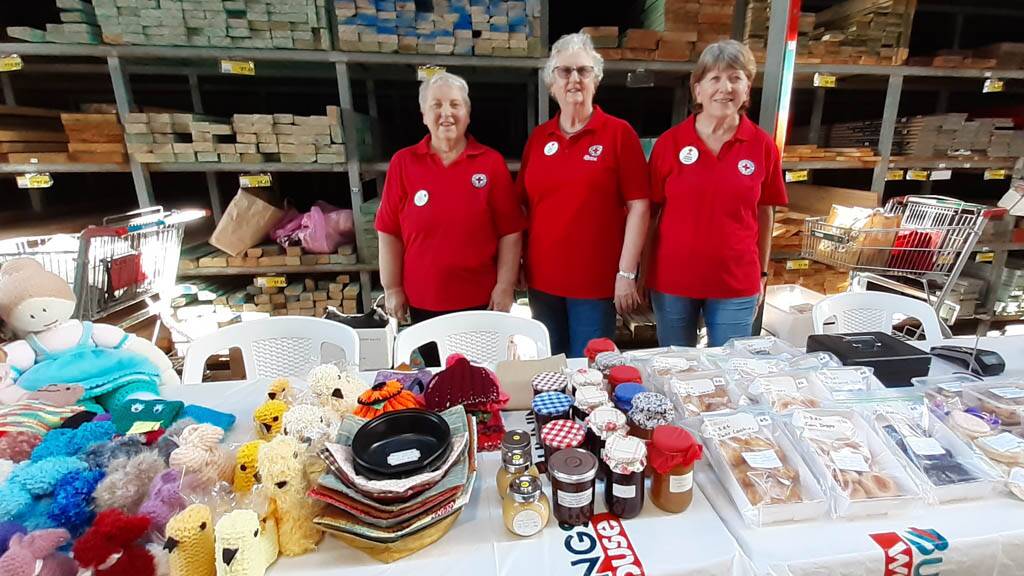 Red Cross members Lesley Harper, Gill Rolfe and Virginia Thomson at the recent Bunnings Family Fun Night. Photo file/supplied