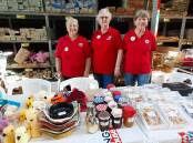 Red Cross members Lesley Harper, Gill Rolfe and Virginia Thomson at the recent Bunnings Family Fun Night. Photo supplied 