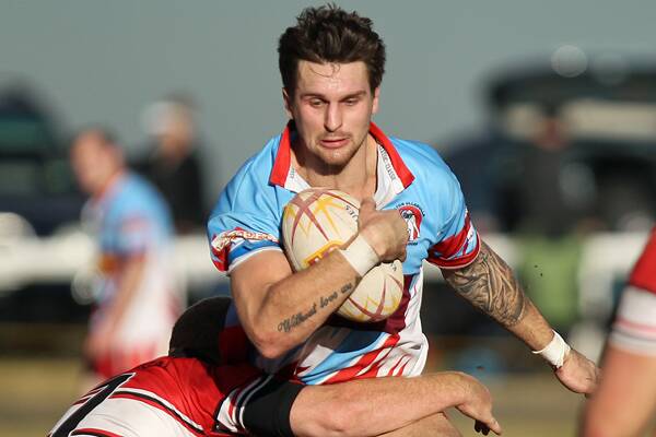 Dylan Smith in action for the Dogs, PHOTO: David Hall.