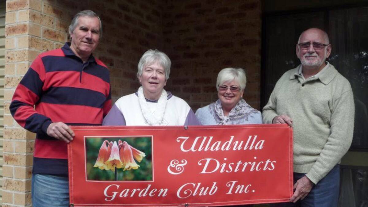 BANNER: Bill Sinclair, Sue McMahon, Heather Steadman and John Steadman displaying the new garden club banner.