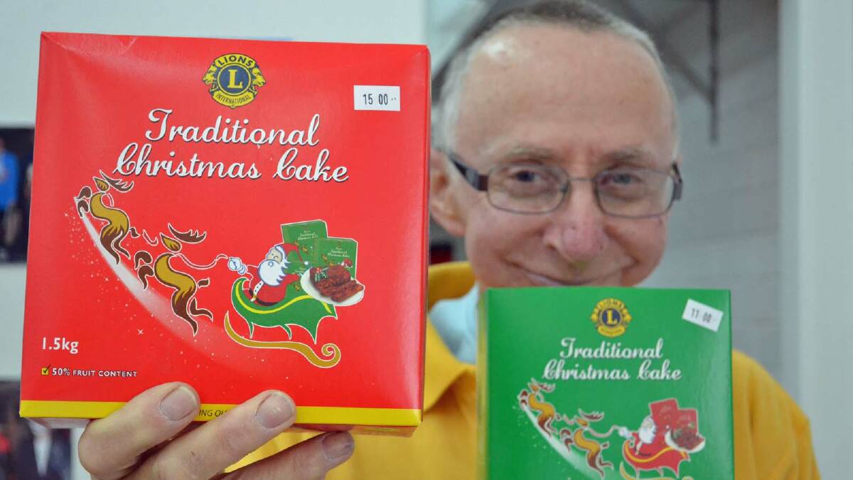 GET CREATIVE: Kevin Oliver with the Lions Christmas cakes that will be decorated by the public and auctioned by the Ulladulla Milton Lions Club.
