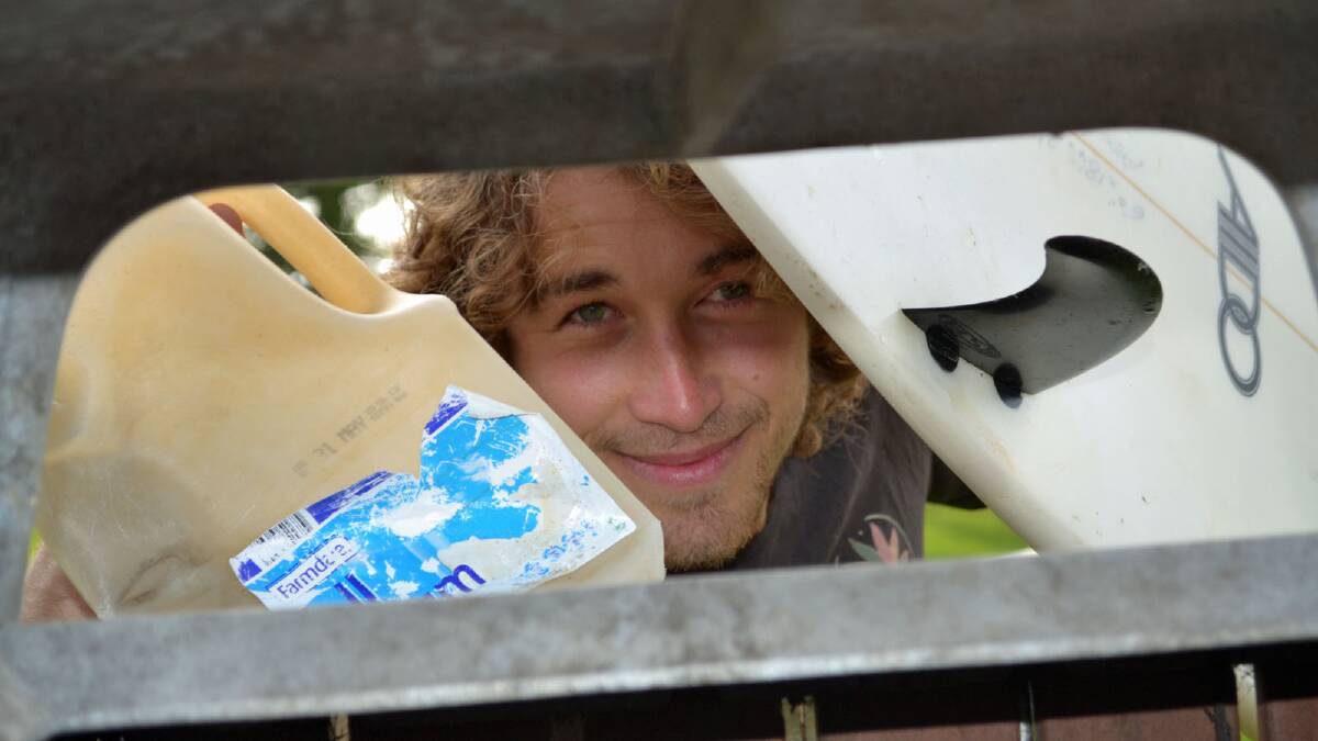 CLEANING UP: Local surfer Jed Garkut does his bit to keep parks and beaches clean, and is calling on the rest of the community to also contribute to protecting the environment.