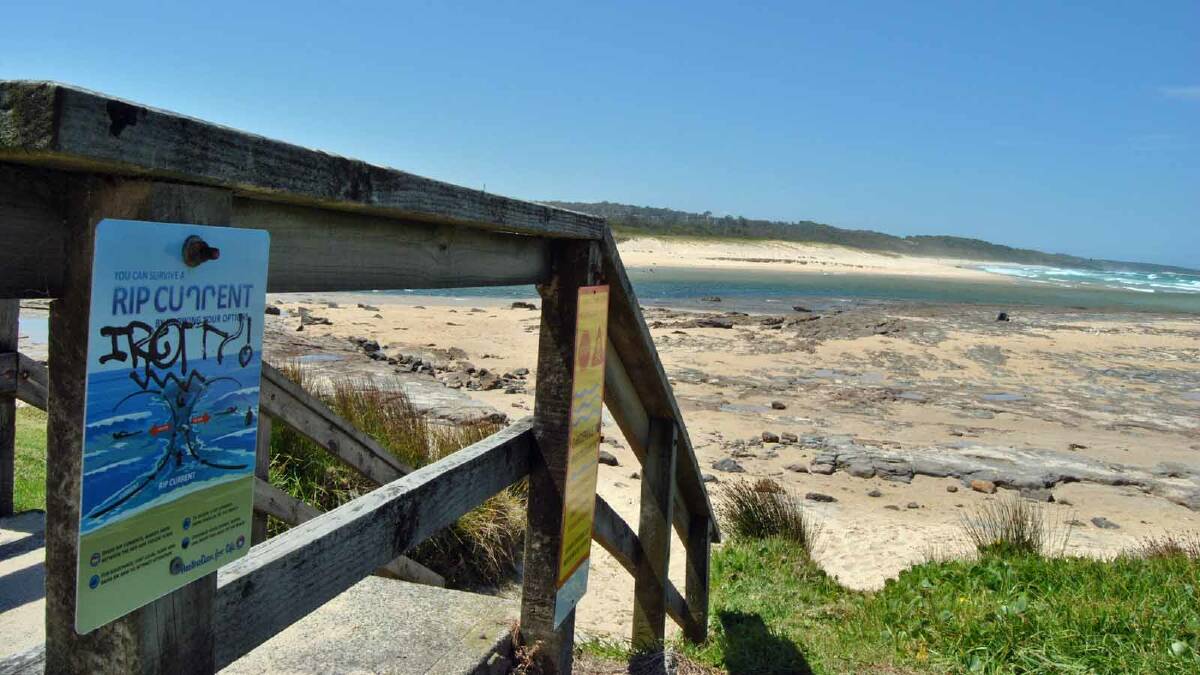 A MAN had drowned while trying to help his two sons when they appeared to get caught in a rip at Burrill Beach about noon on Friday.