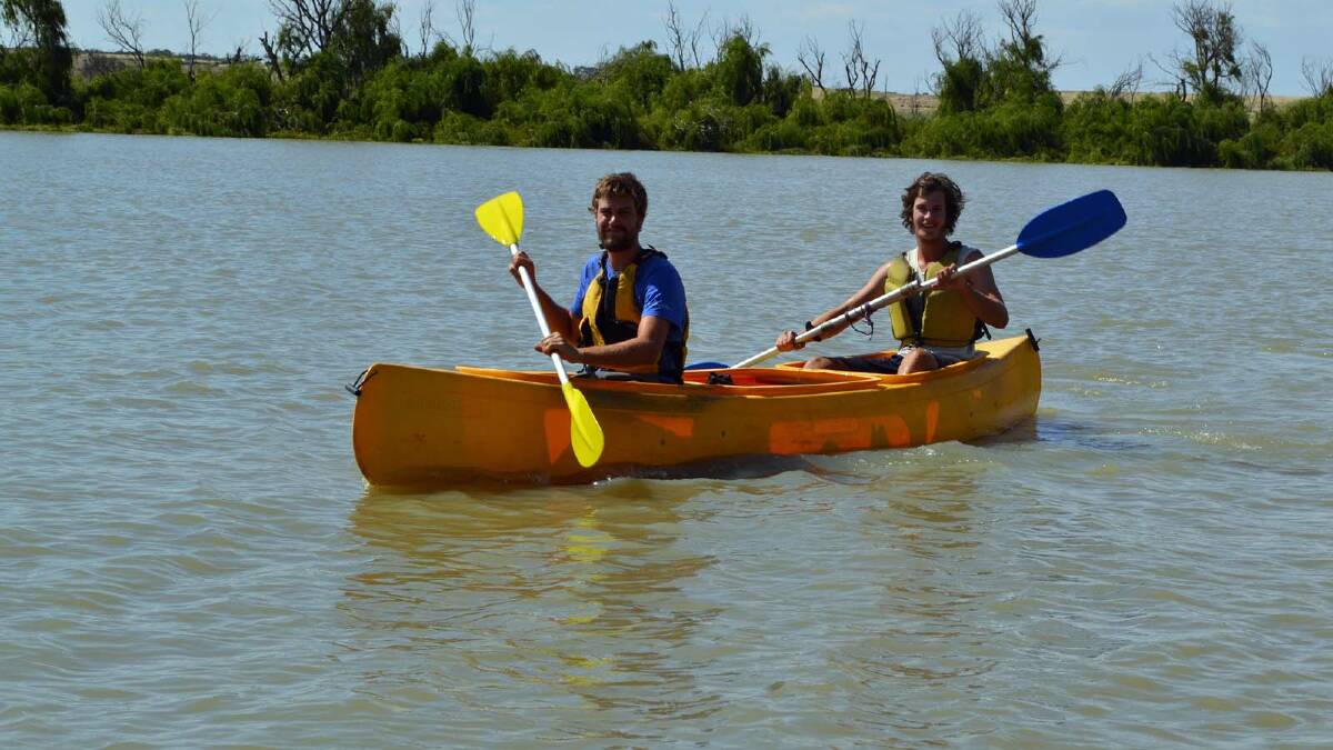 CANOEING: James Knight and John Miller pictured during their paddling journey in Murray Bridge, South Australia.