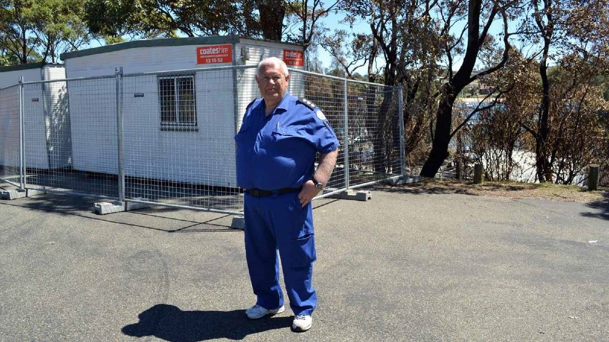 GODSEND: Ulladulla Marine Rescue Unit Commander Ken Lambert in front of the two demountable buildings donated by Coates Hire Ulladulla for use as a radio base.