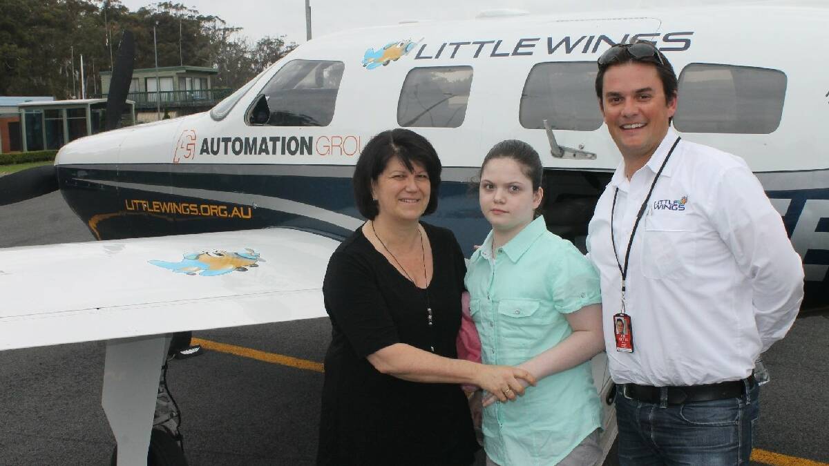 MERIMBULA: Lisa and Alayne Drowley arrive home   after more than 400 days in Westmead Children’s   Hospital, flown to Merimbula by Little Wings   pilot Adrian Nisbet.