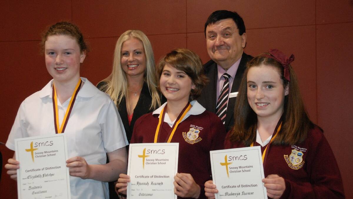 COOMA: Cooma-Monaro Shire Council’s general manager   John Vucic presented Year 8 class awards to   Snowy Mountains Christiasn Schoolm students   Elizabeth Fletcher, Hannah Learoyd and   Mackenzie Farmer, while teacher Catherine   Johnson looks on.