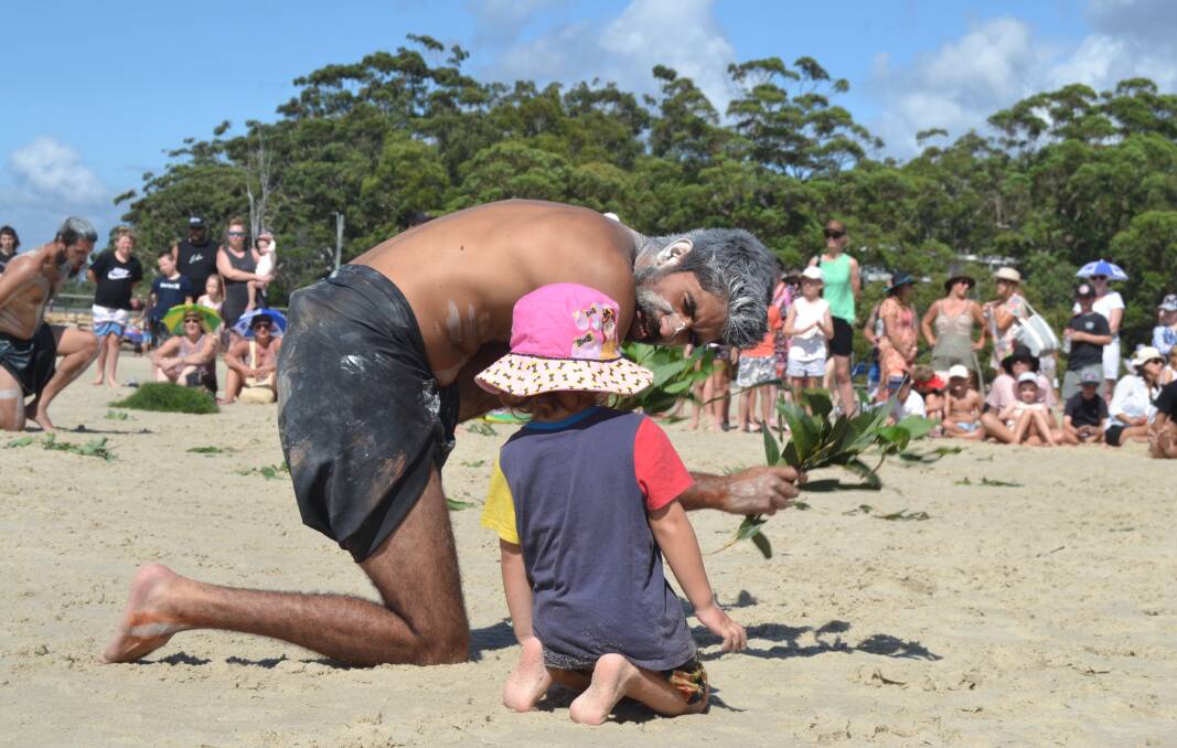 The crowd were invited to get involved in dances at Moona Moona Creek, Huskisson on January 26. Image: Grace Crivellaro.