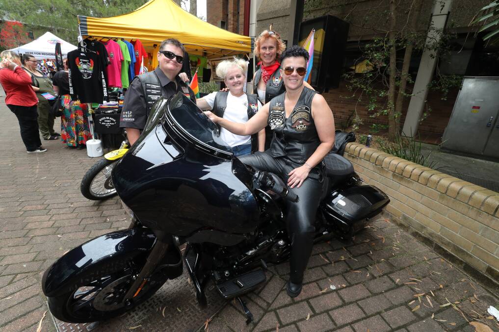 Dykes on Bikes members Cass, Sharon, Jaz and Nadine posing outside their stall on November 12. Picture by Robert Peet