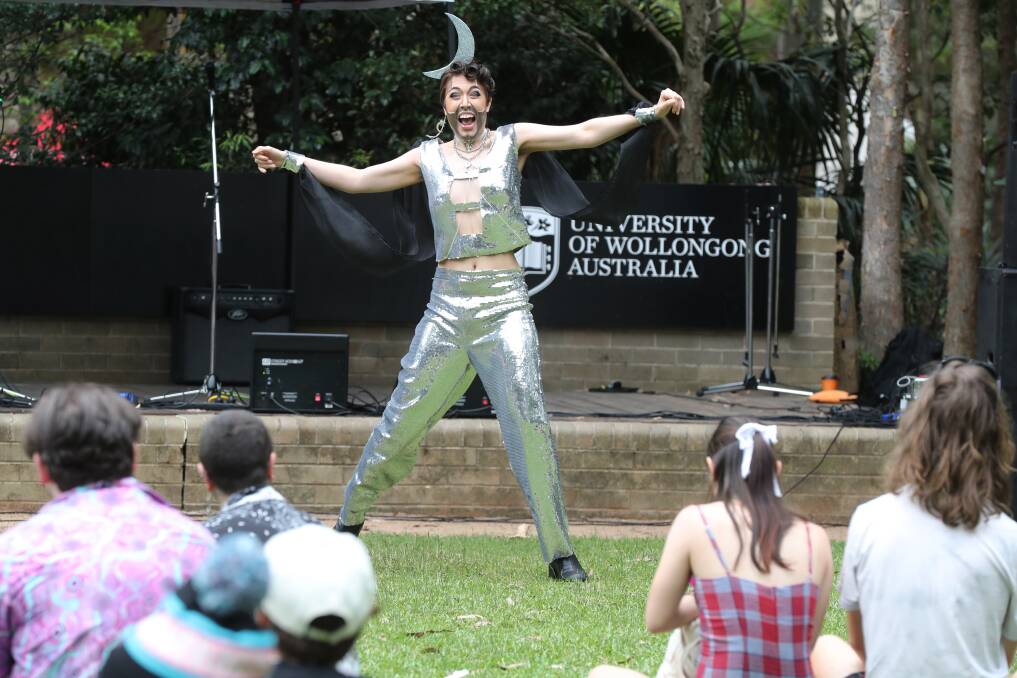 Drag king Magnus Opium performing at the University of Wollongong's duck pond lawn at the second Trans and Friends Festival on November 12. Picture by Robert Peet