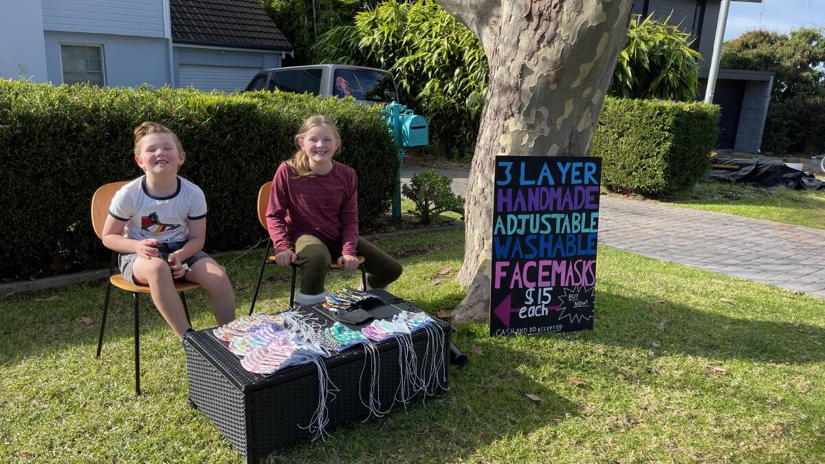 HANDY HELPERS: Lauren Martin's children Bowie, 7, and Andie, 10, set up a stall out the front of their Mollymook home to help out. Image: supplied.