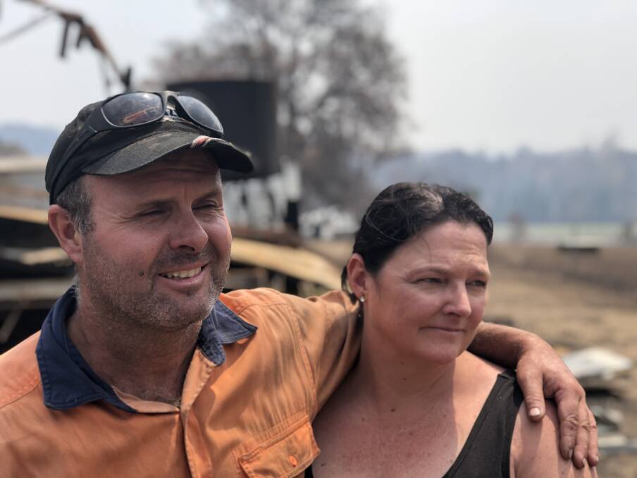 Guy and Caroline McPhee in the immediate aftermath of the black summer bushfires.