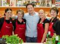 Jamie Oliver with workers from his 'Ministry of Food'. Picture: Jamie's Ministry of Food Australia