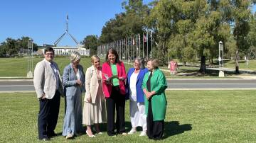 Quilpie Shire Council CEO Justin Hancock, Dr Helen Haines MP, Real Estate Institute of Australia CEO Anna Neelagama, Regional Australia Institute CEO Liz Ritchie, Master Builders Australia CEO Denita Wawn and Australian Local Government Association president Cr Linda Scott outside Parliament House in Canberra. Picture by Brittney Levinson