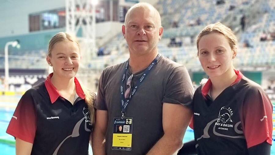 STARS OF THE WATER: Talika Irvine (Left), Coach Stephen Alderman (Centre), and Jasmine Greenwood (Right). Picture: Supplied. 