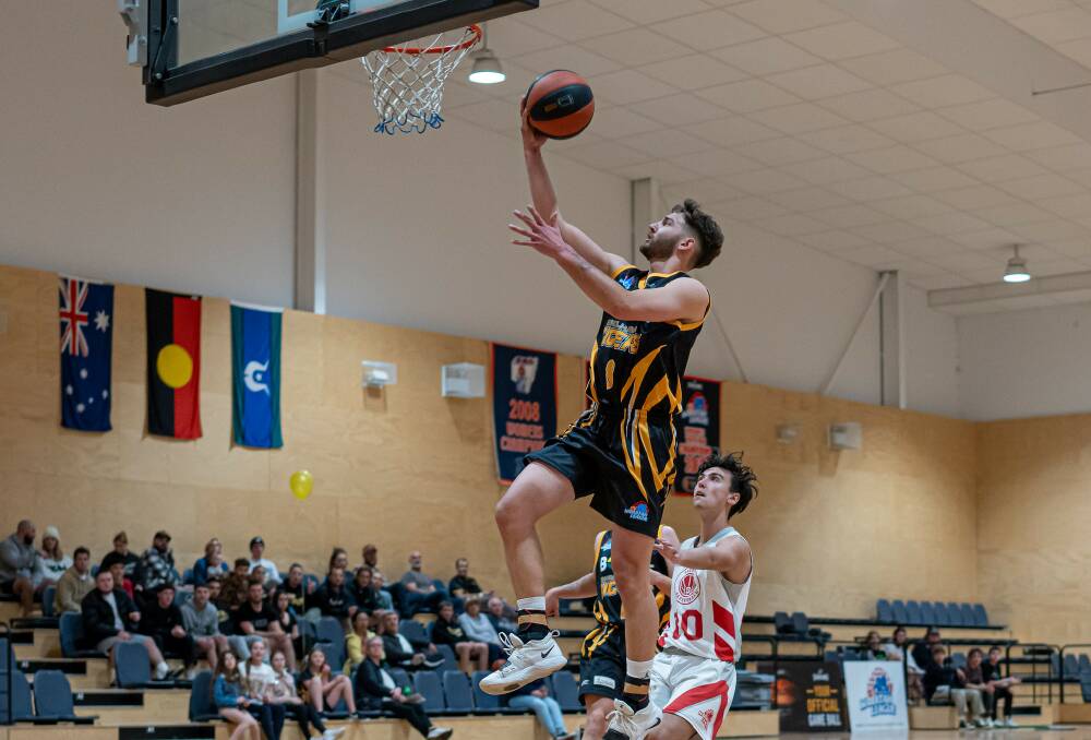 HANG-TIME: Brayden Morris (pictured) going for the lay-up against St George last weekend. Picture: SHOALHAVEN BASKETBALL ASSOCIATION. 