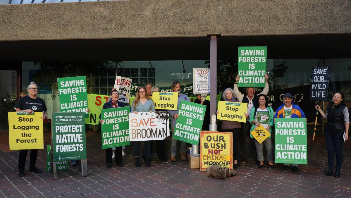Activists from Brooman State Forest Conservation Group and Manyana Matters demonstrated outside the Shoalhaven City Council chambers ahead of Monday's meeting. Picture by Jorja McDonnell.