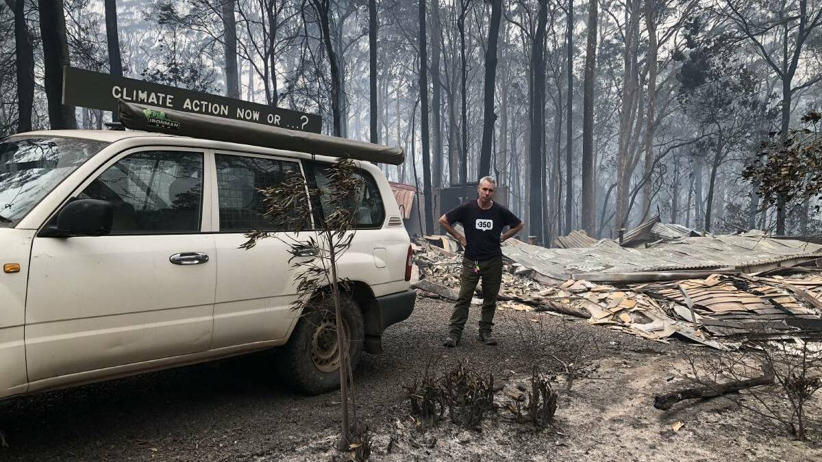 Rosedale resident Jack Egan and the remains of his house after the Black Summer Bushfires. Picture: supplied.