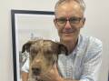 Dr Neal Johnson and dog James. Picture: Supplied. 