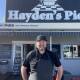 Hayden Bridger with his famous pie shop, 'Hayden's Pies'. Picture: Tom McGann. 
