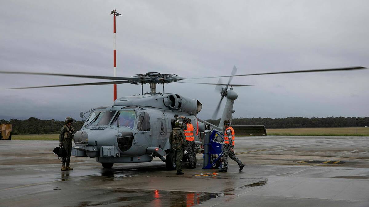 A Seahawk MH-60R Romeo helicopter is prepared for flight at HMAS Albatross. File photo.