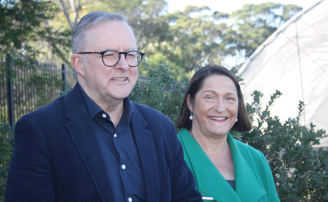 Prime Minister Anthony Albanese is joined by Federal Member for Gilmore, Fiona Phillips, as he praises the work of the Milton Rural Landcare Nursery. Picture by Glenn Ellard.