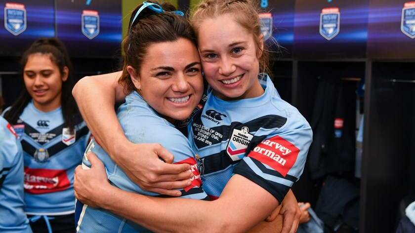 South Coast talents Millie Elliott (nee Boyle) and Kezie Apps after an NRLW Origin win in 2019. File picture.