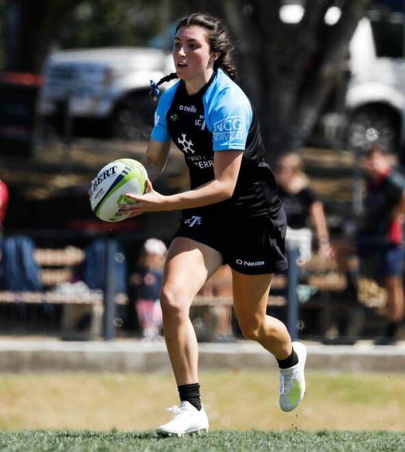 Ulladulla product Lily Murdoch, in action for the University of Canberra, won the South Coast Rugby Sevens in 2019. Photo: KAREN WATSON