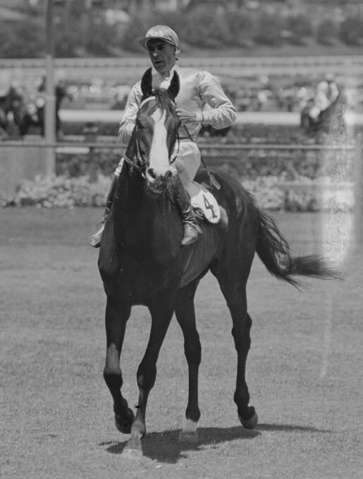 Darby Munro riding racehorse Alleviate in 1933.
