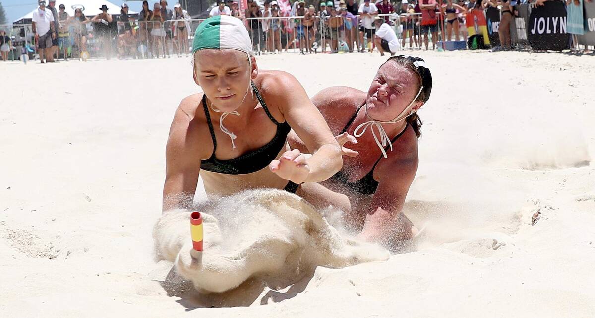 Currumbin's Brittany Brymer beats Mollymook's Payton Williams to the flag. Photo: SLSNSW