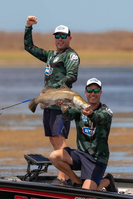Mark Healey and Liam Carruthers show off on of their catches. Photo: Adam Royter