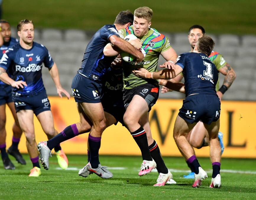Milton-Ulladulla product Jack Murchie takes a hit-up for the Warriors against the Storm. Photo: NRL Imagery