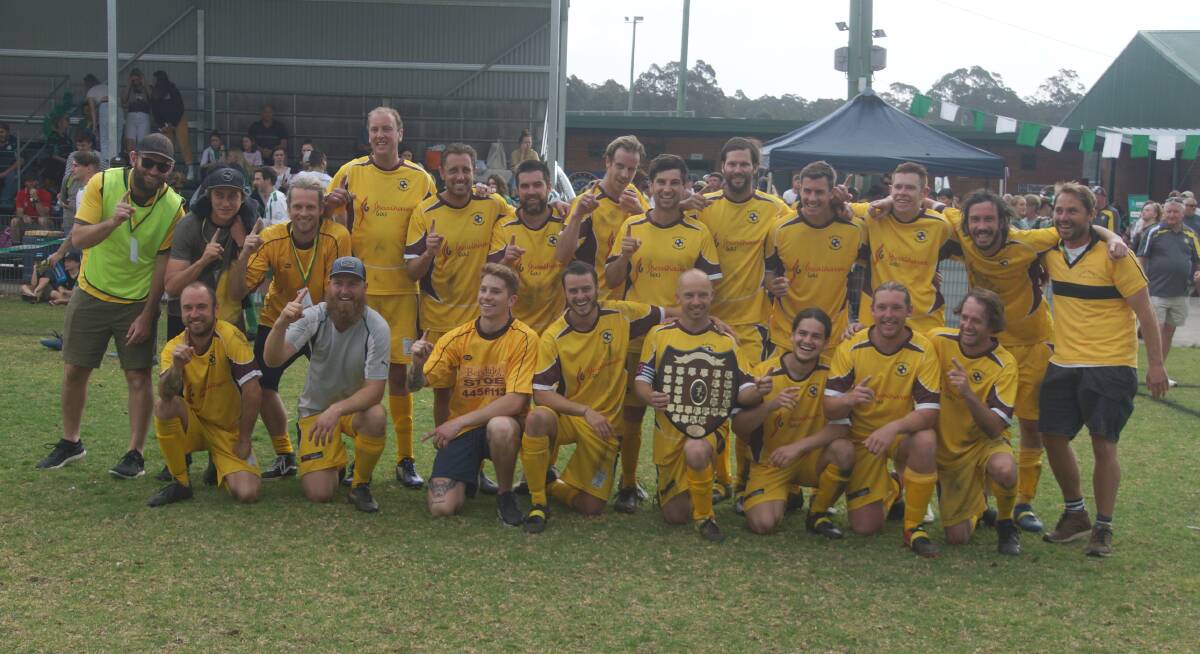 CELEBRATION TIME: Manyana are all smiles with their Shoalhaven District Football Association third grade shield on Saturday at Ison Park. Photo: RACH HALL
