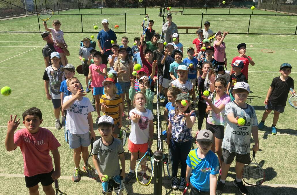 Holiday fun: Kids enjoying the school holiday clinics at Ulladulla courts with head coach Kev Murphy and trainee coaches Ryan, Rylan and Tyrone.