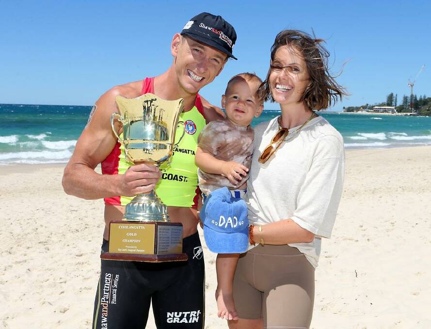 Kiama's Ali Day with son Danny and wife Kel after the win. Photo: SLSA