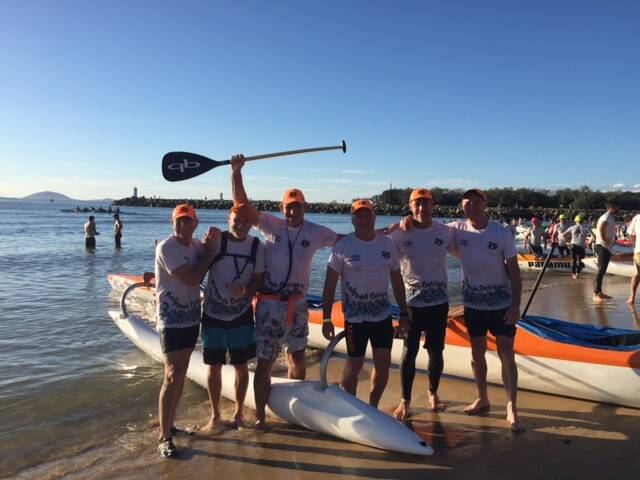 Third place: Mollymook Outriggers men's crew at the Mooloolaba event.