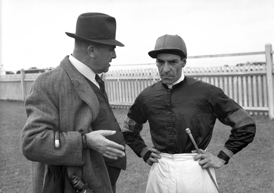 Les Haigh and jockey Darby Munro in Sydney in May 1959. Photo: FISHER
