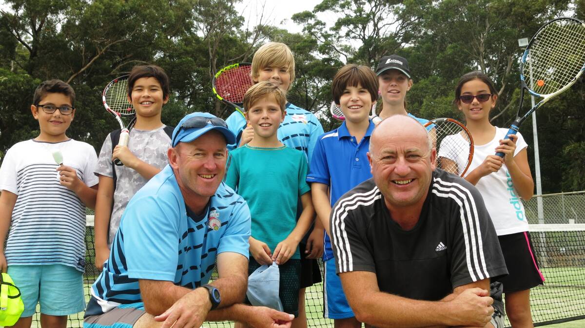 Finals time: Coach Kevin Murphy and MUDTA Junior Development Officer Andrew Edgar with Saturday morning competition players Reece, Tom, David, Tom, Manny, Darcy and Keitara.
