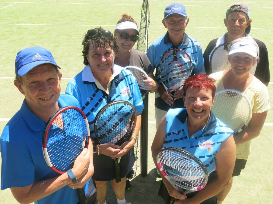 READY FOR ACTION: Lara Bennett, Doug Parker, Mike Lynne, Lee Dickson, and Norm Holcroft get together with tournament organisers Val Crook and Mary Lou Barclay.