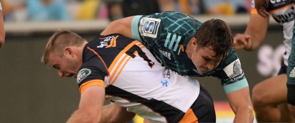 ACT'S Will Miller is tackled during his team's match with the Highlanders. Photo: BRUMBIES MEDIA